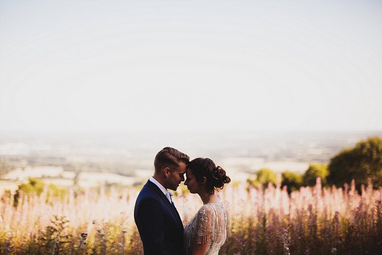 A wedding portrait taken by Kent wedding Photographer Paul Fuller of a bride and groom over looking the South Downs in Kent