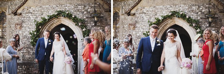 Bride and Groom leaving the church and wedding guests throwing confetti
