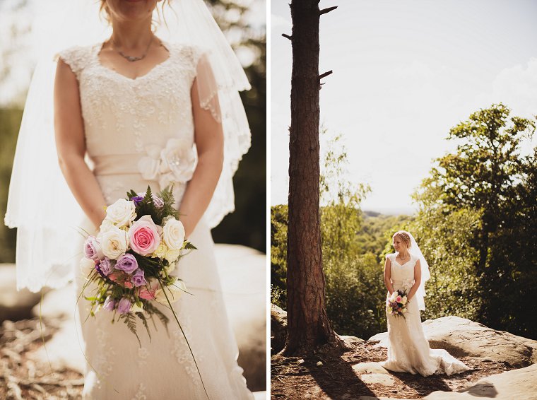 Wedding Portrait of a bride on top of some rocks over looking the Kent Countryside photographed at High Rocks in Tunbridge Wells in Kent
