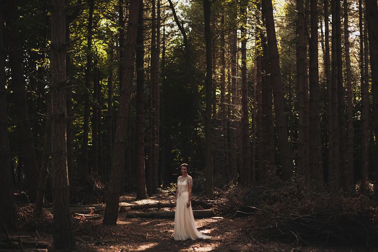 Bride in a kent wood following her wedding
