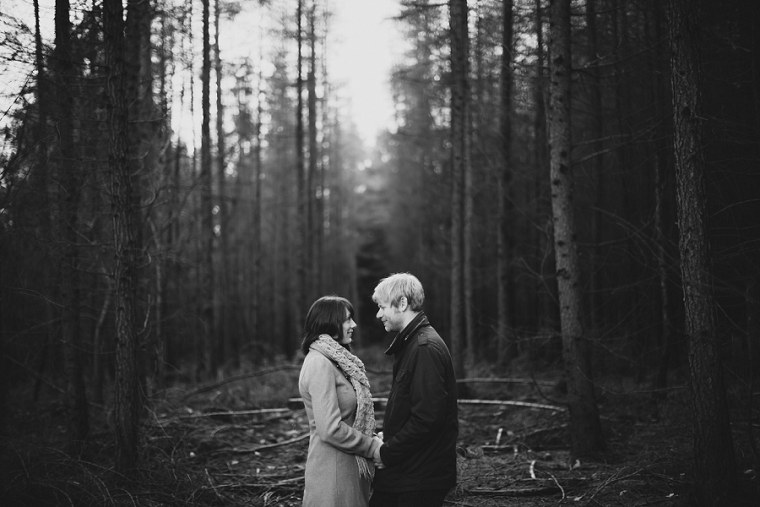 Kyla and Tom Pre Wedding Shoot at Bedgebury Forest in Kent 004 Black and White photo of Kyla and Tom looking in to each others eyes during their pre wedding photography session