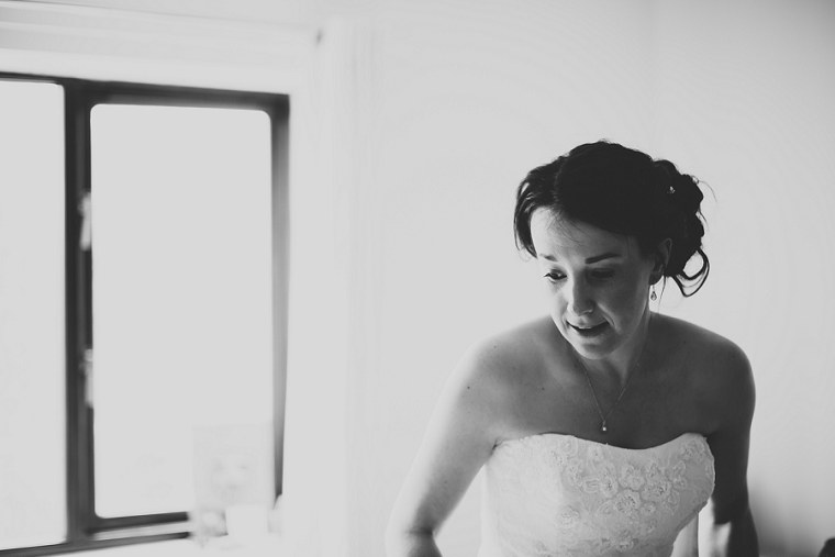 Black and White photograph of a bride as she waits to leave for her wedding at Mount Ephraim in Kent
