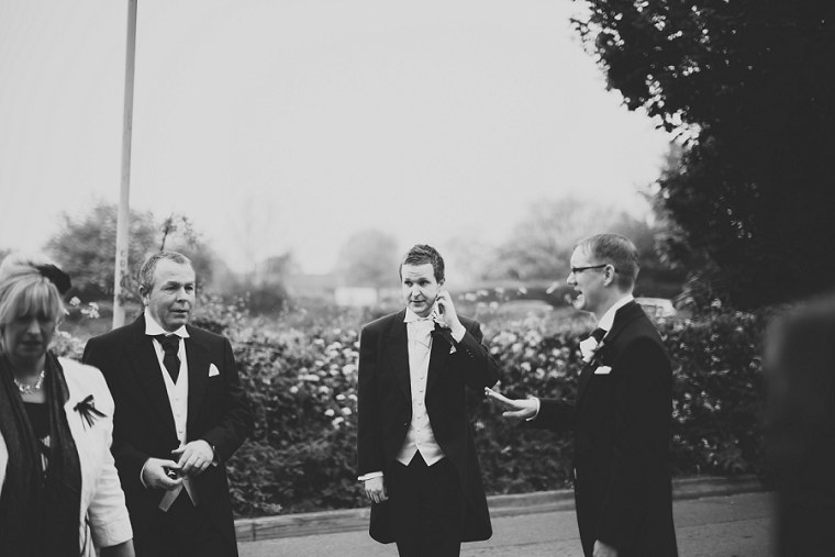 Groom looking nervous before the start of his wedding