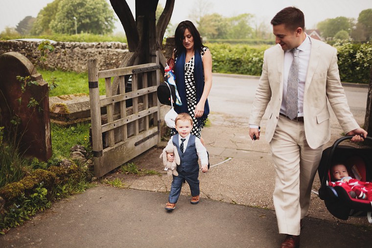 Wedding guests arriving at Saint Mary's church in Kent