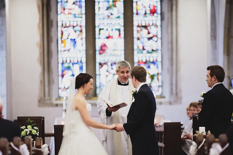Vicar during wedding service