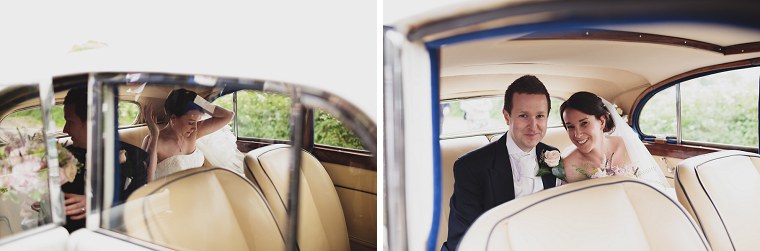 Bride and groom sitting in white rolls royce wedding car
