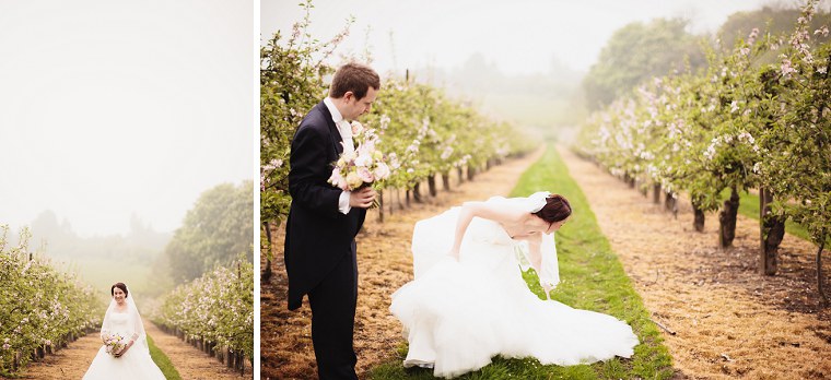 Bride and groom walking through the gardens of Mount Ephraim