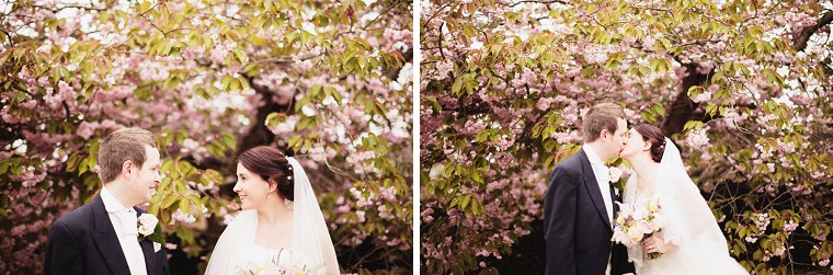 Wedding portrait of wedding couple in front of a blossom tree at Mount Ephraim