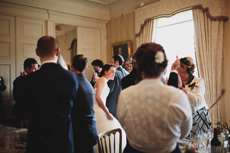 Bride and Groom being cheered as they enter the reception