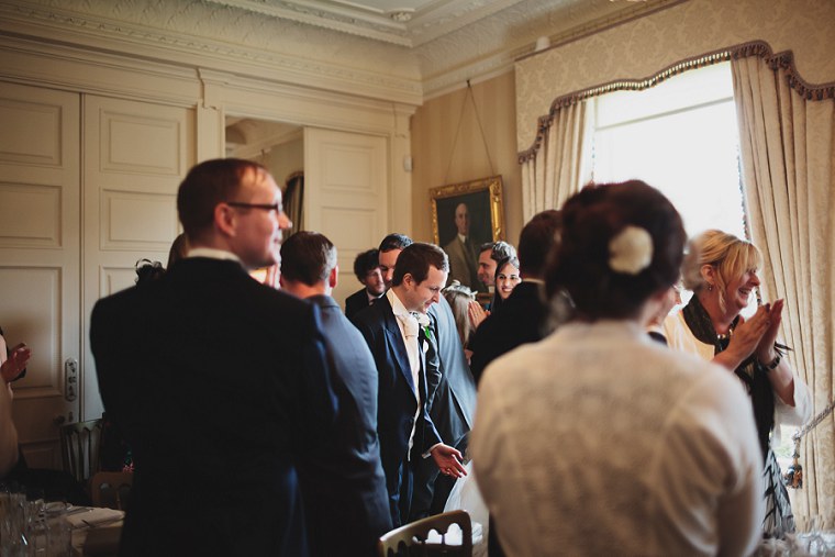 Bride and Groom being cheered as they enter the reception