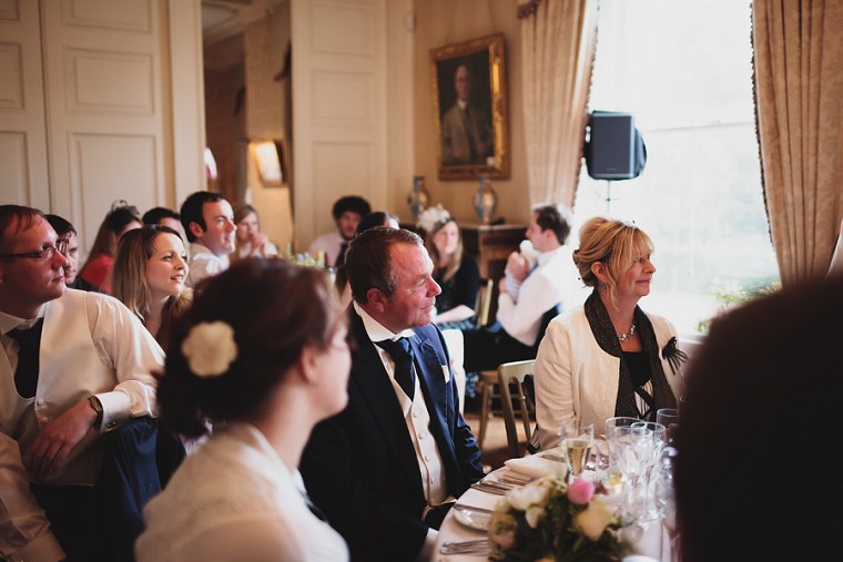 Father of the groom watching his son's speech
