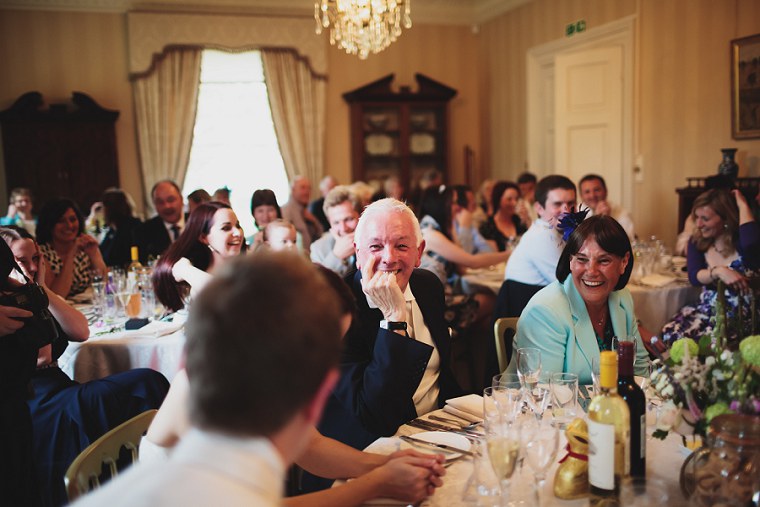 father of the bride laughing during the best mans speech