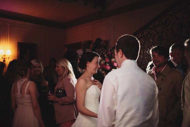 Bride and Groom walking on to the dance floor to start their first dance at Mount Ephraim Gardens