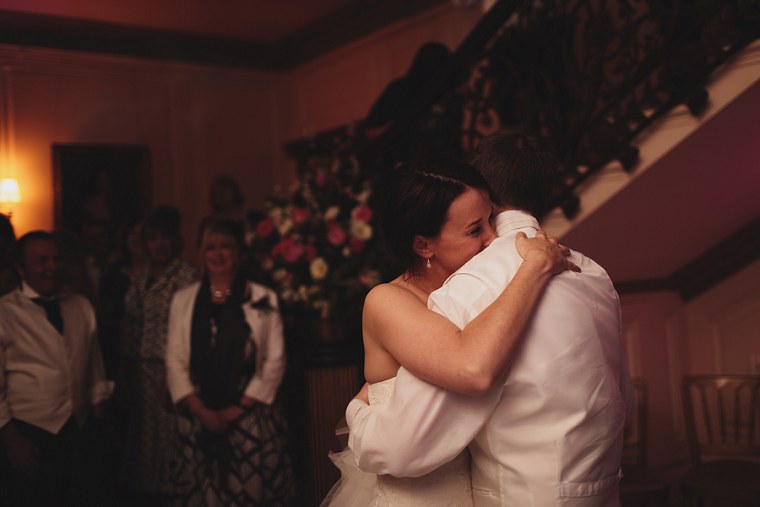 Bride and groom hugging