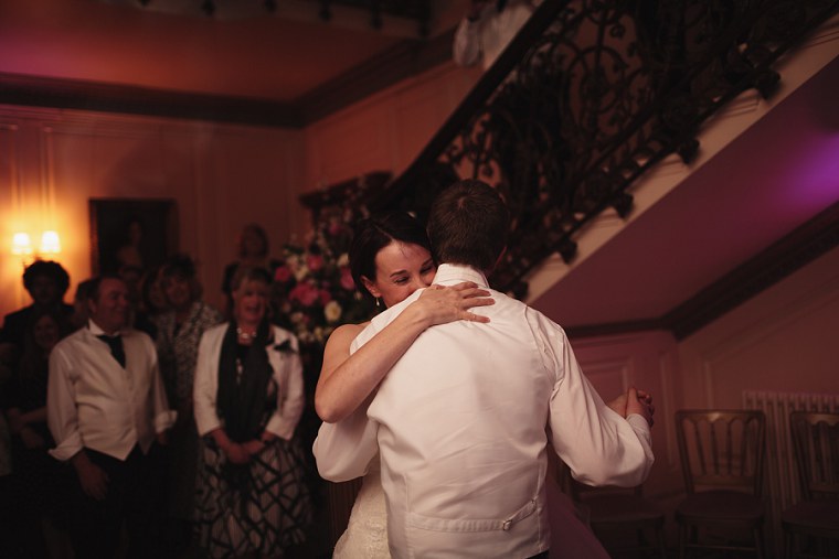 Bride and groom hugging