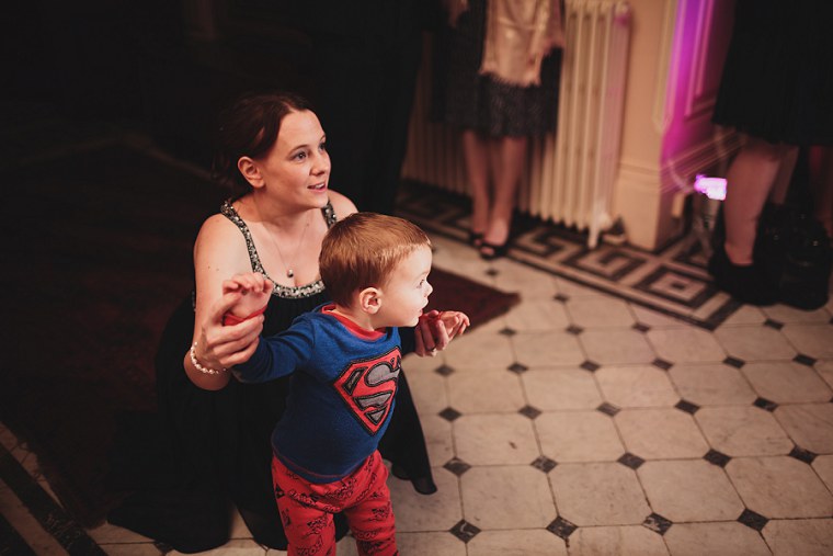 Page boy looking on at first dance