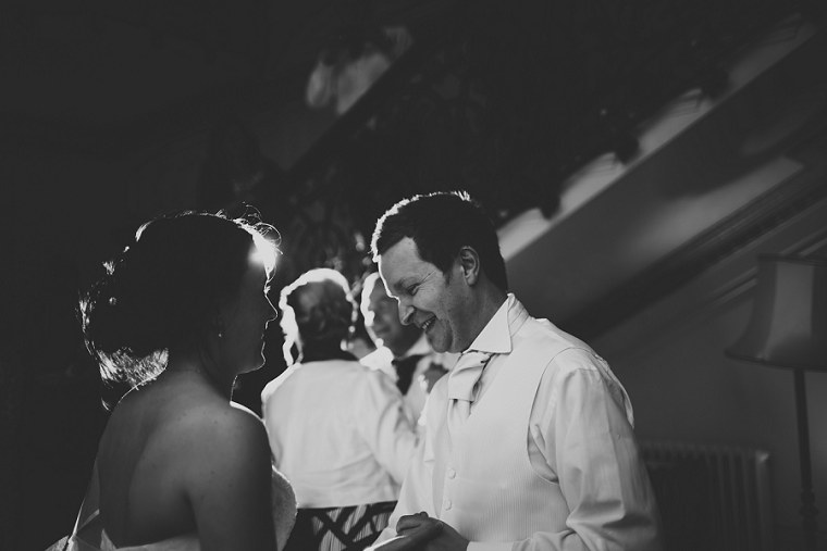 Bride and groom laughing during their first dance at Mount Ephraim Weddings in Kent