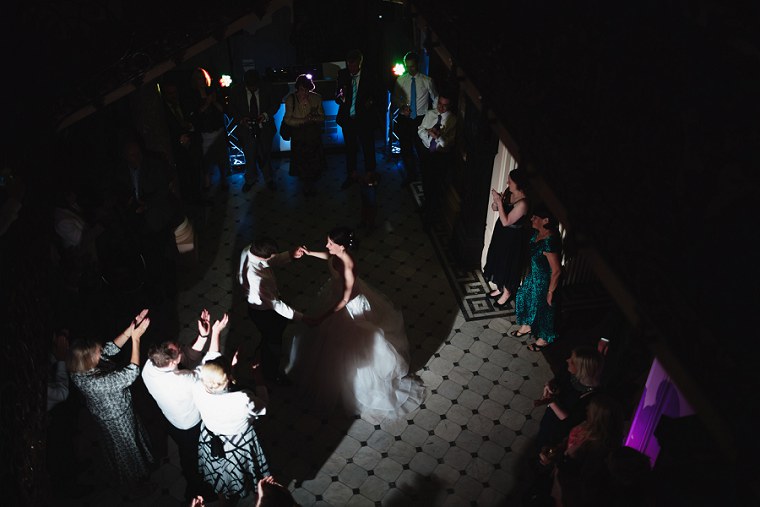 Wedding guests cheering
