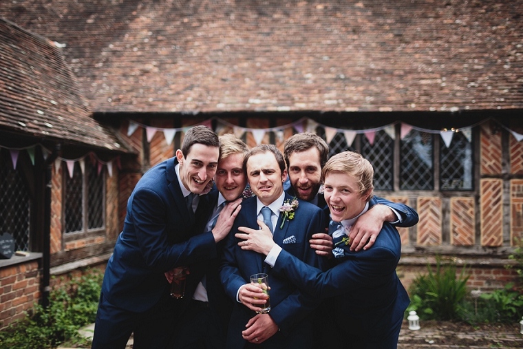 Casual group shot at Kent wedding in Chilham