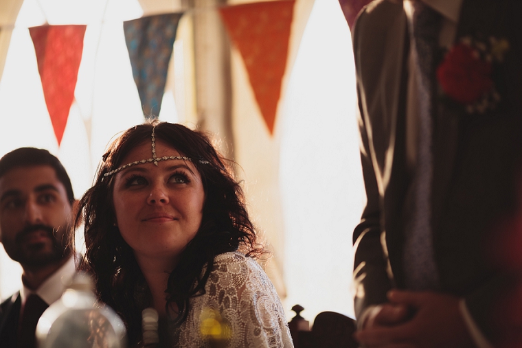 Bride watching her fathers speech at St Mary's church wedding