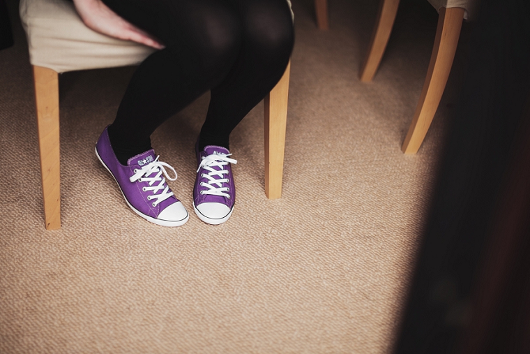 Bride wearing converse trainers